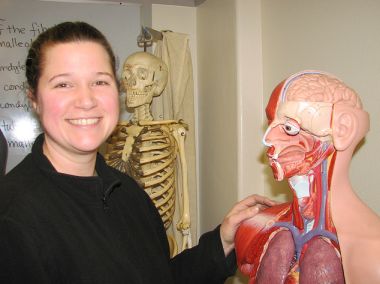 student with skeleton model